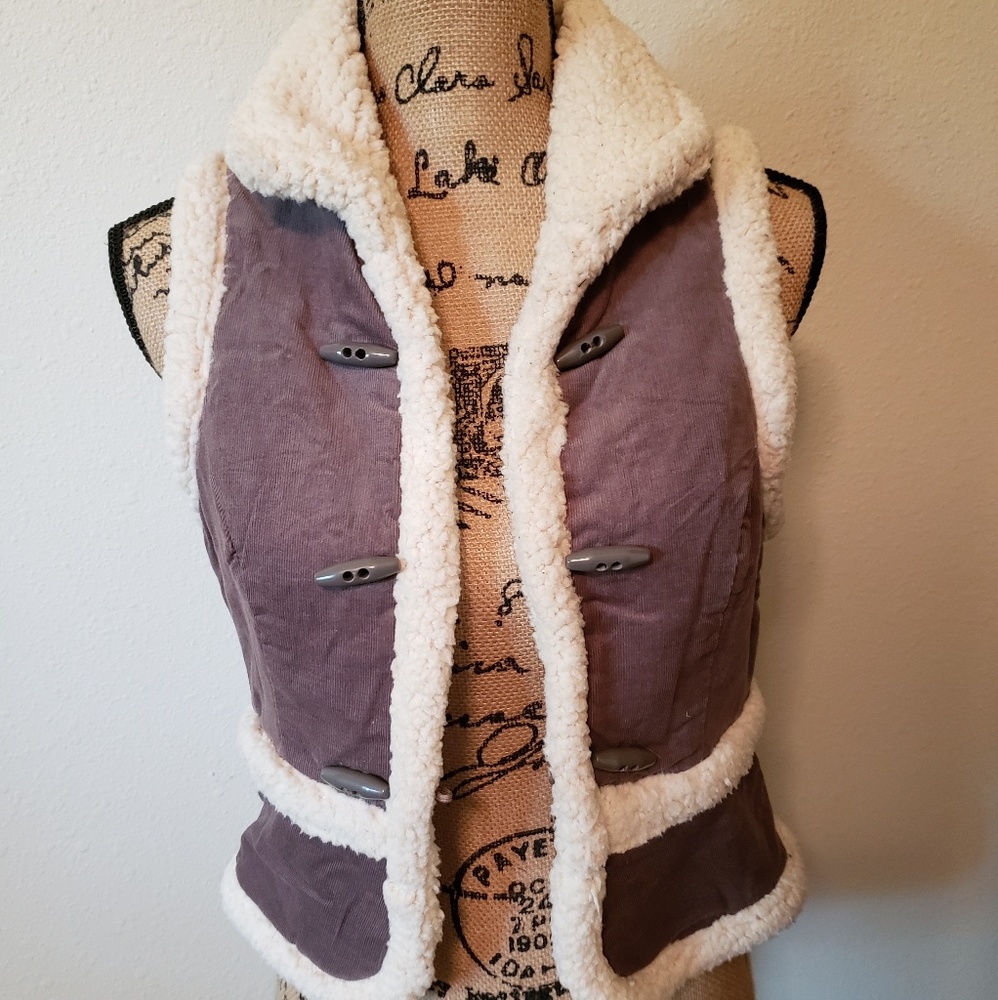 Brown and white vest